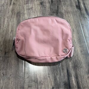 Lululemon belt bag light pink color